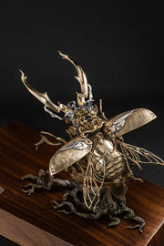 Ghostface Beetle stag beetle with its wings spread on a wooden display stand