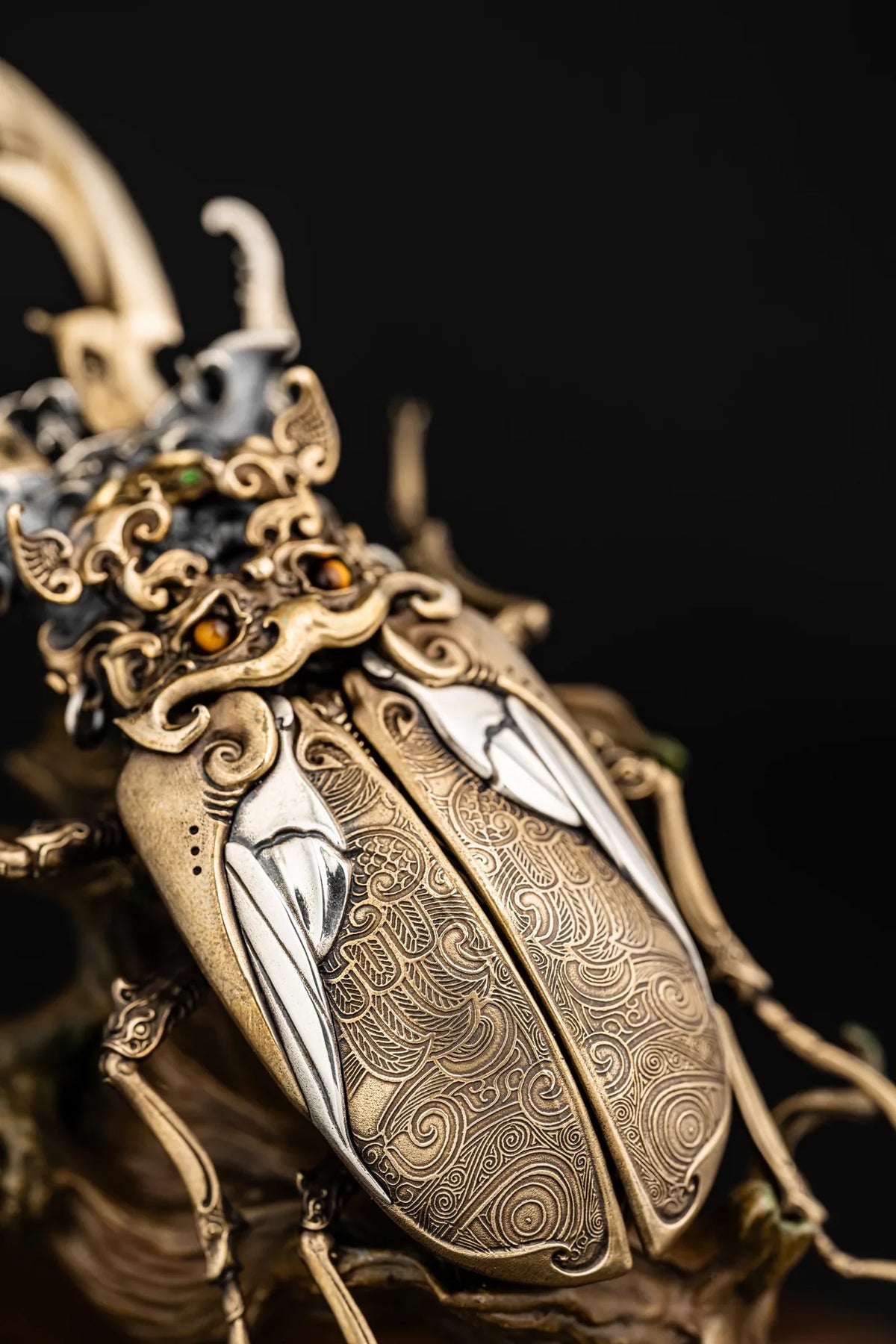 Ghost-mask motifs and sculpted wing-case details on the Ghostface Beetle stag beetle