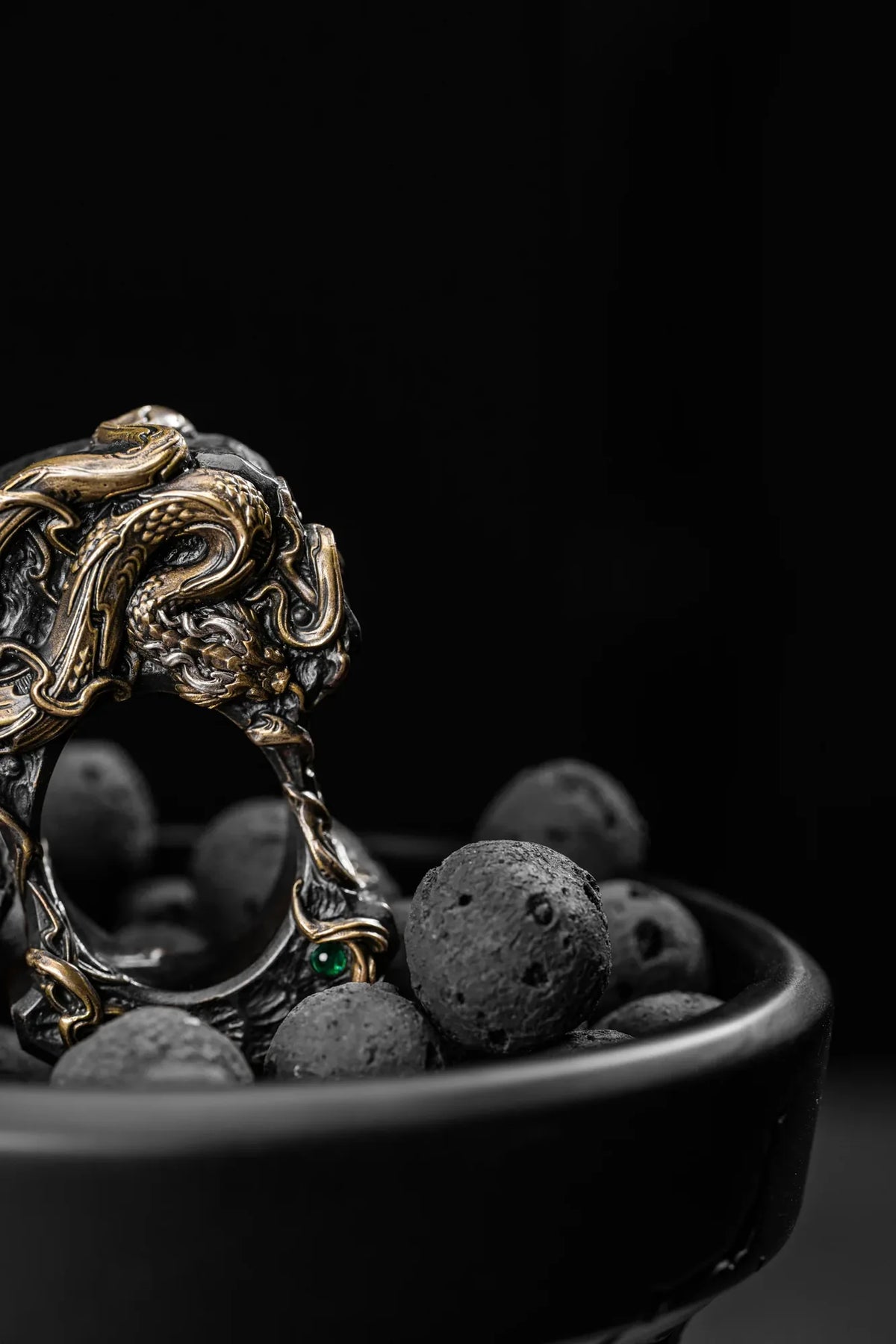 MTAK × WUYIN Vine Serpent knuckle accessory, with a sculpted serpent coiled around a black body