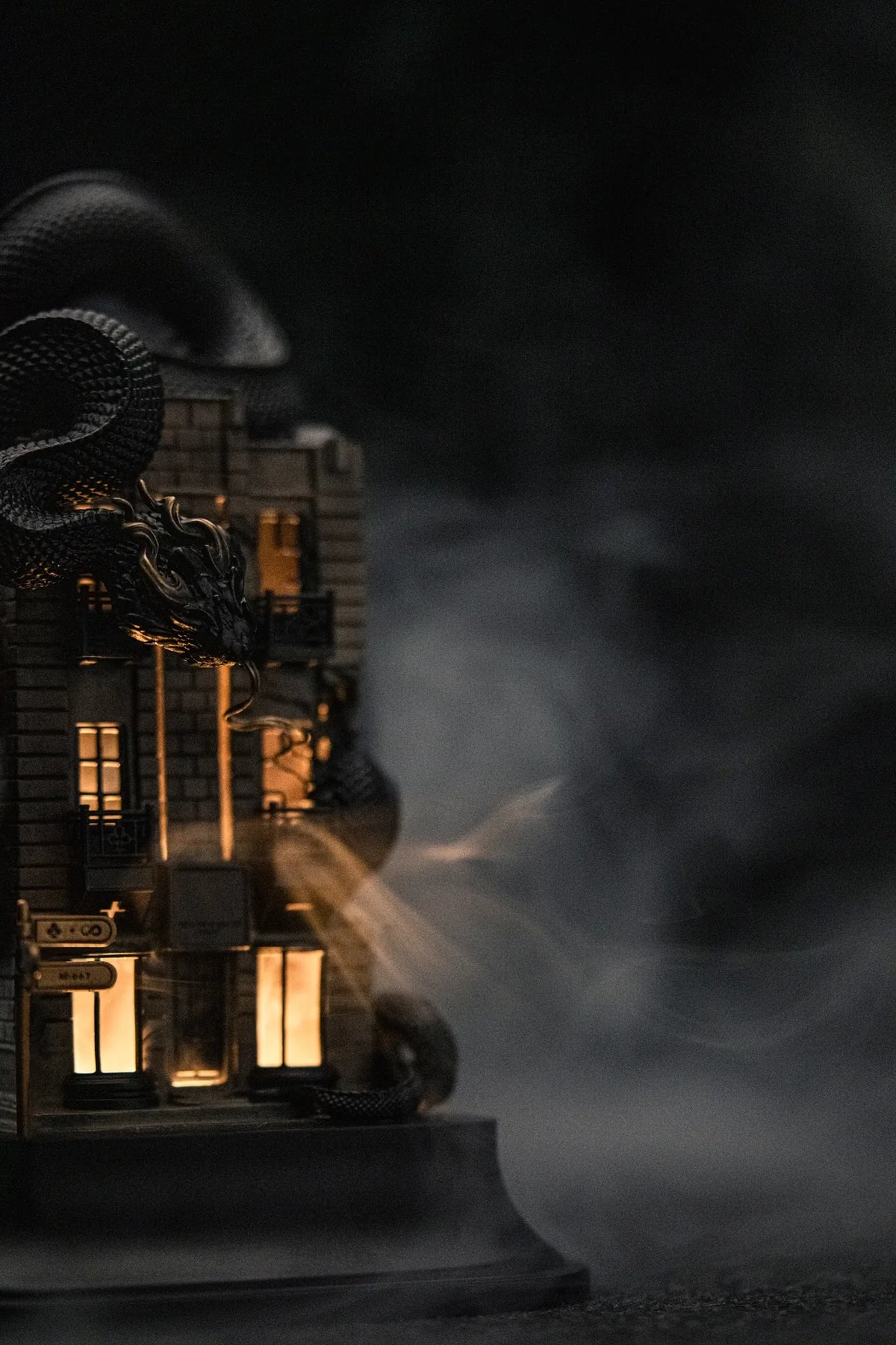 WUYIN × NOCAL:LOWCAL serpent house light and incense burner, with a serpent coiled around the building