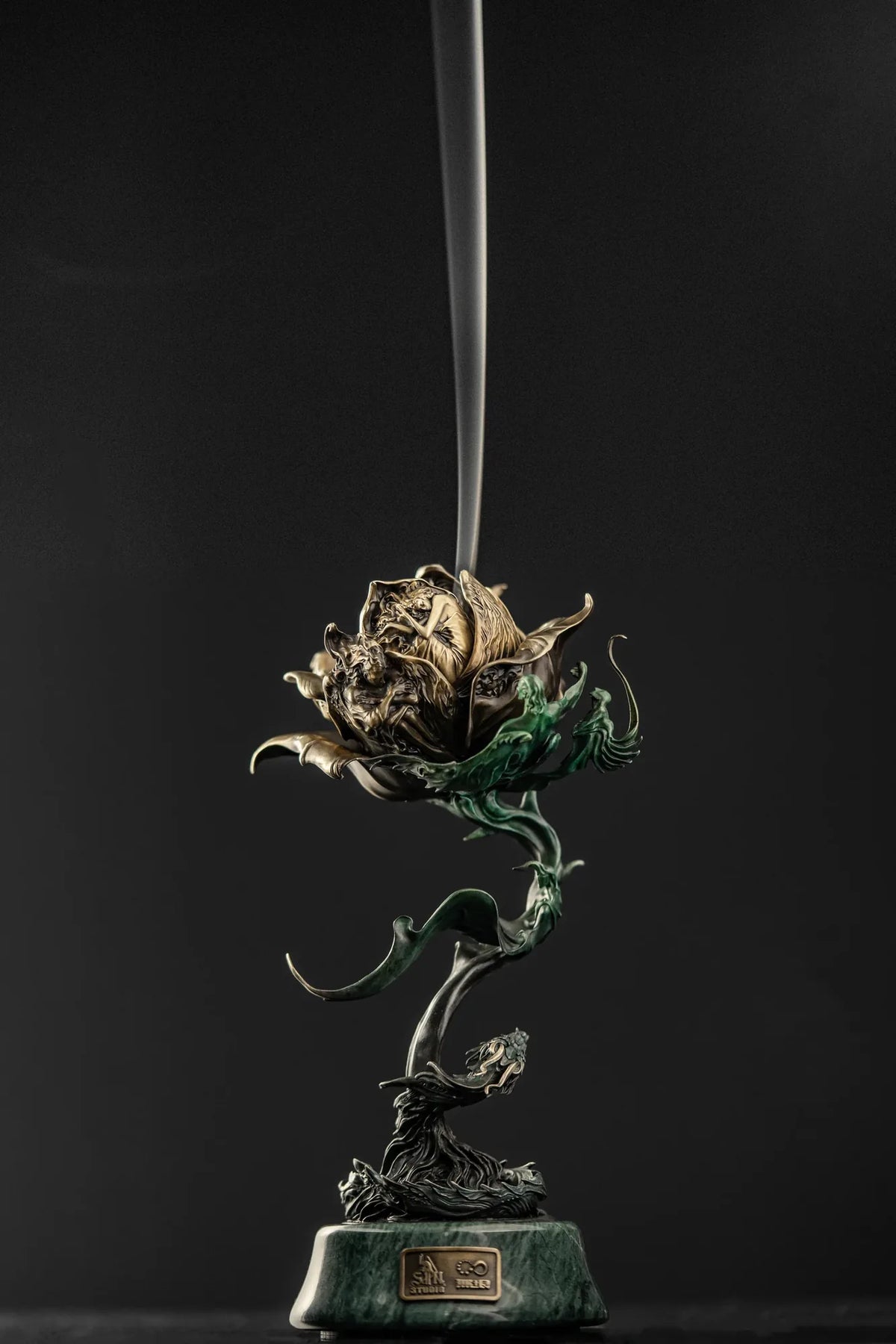 Full view of the Celestial Rose incense burner in its standard finish, with incense smoke