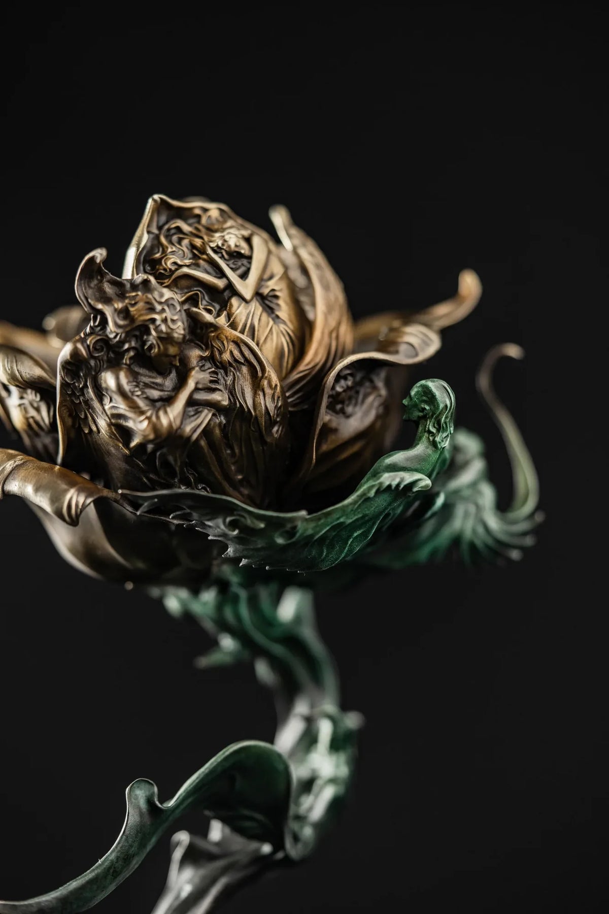 Angelic figures sculpted into the petals of Celestial Rose