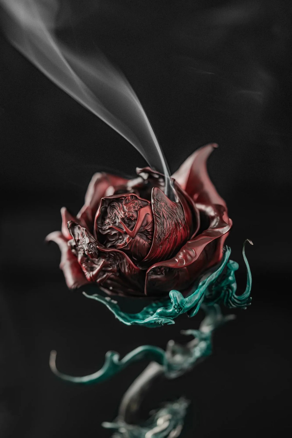 Red Celestial Rose petals surrounded by incense smoke
